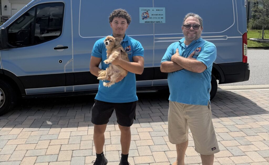 Carlos and the Carlos & Brian Handyman crew with the work van in Wesley Chapel, FL